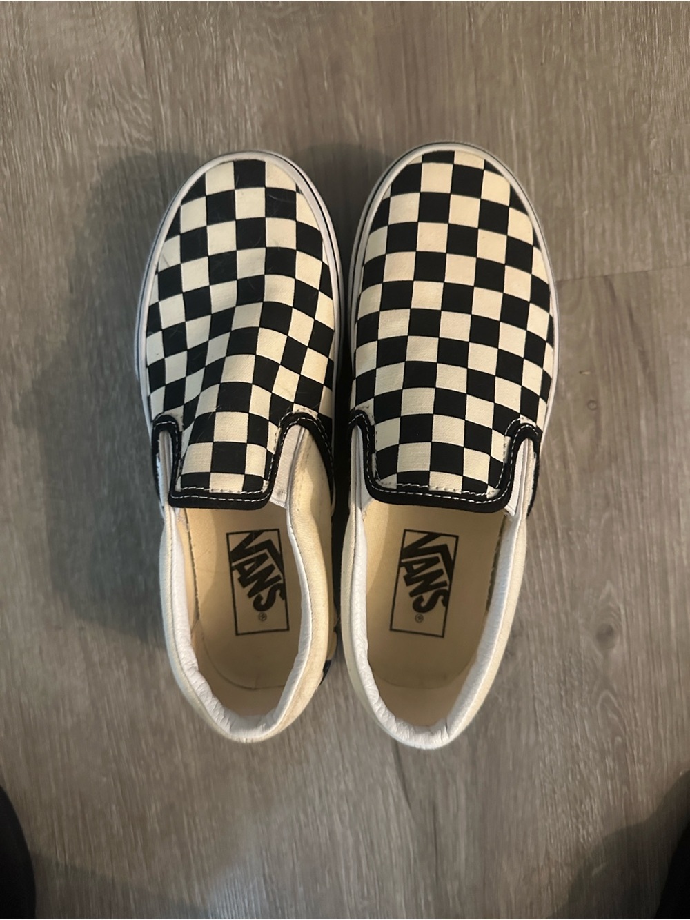 Vans Checkerboard platform Slip-On Sneakers in Black and White